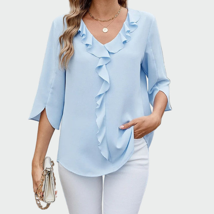 Elegant, sophisticated, and universal blouse